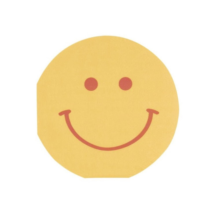 Yellow round paper napkins with red eyes and smiling mouth