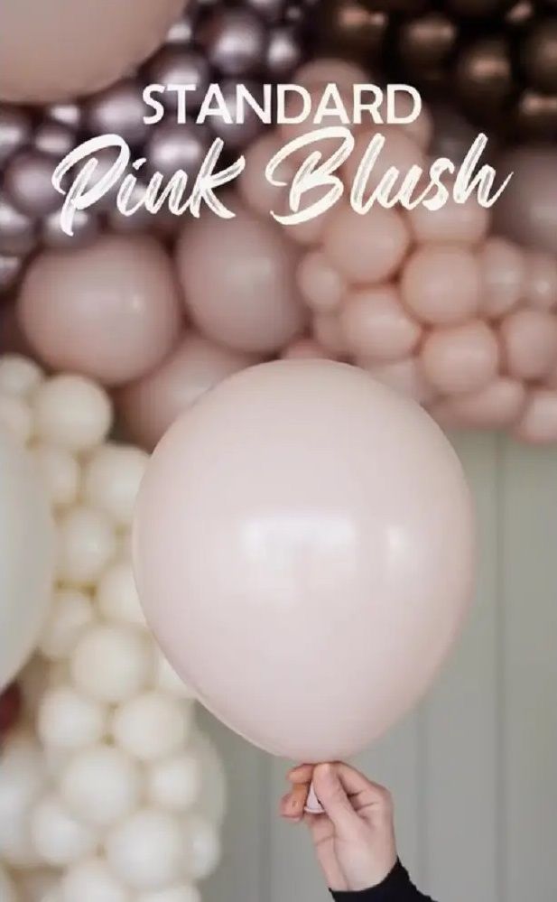 Pink Blush Kalisan latex balloon being held